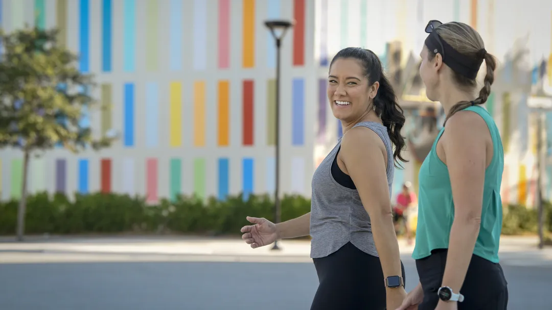 Two women walking outdoors