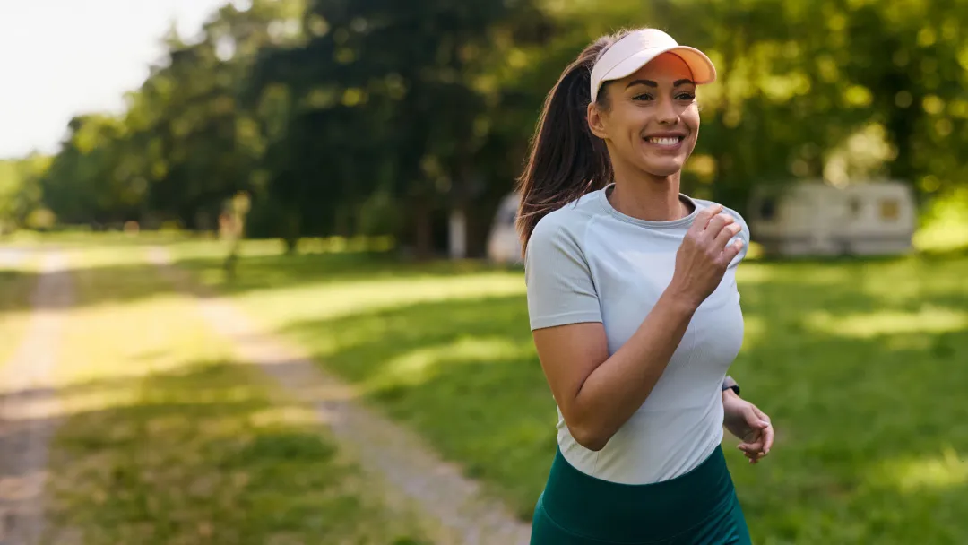 A Woman Goes For a Run in Park