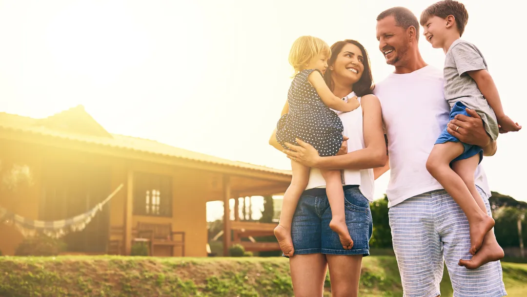 Family in front of home
