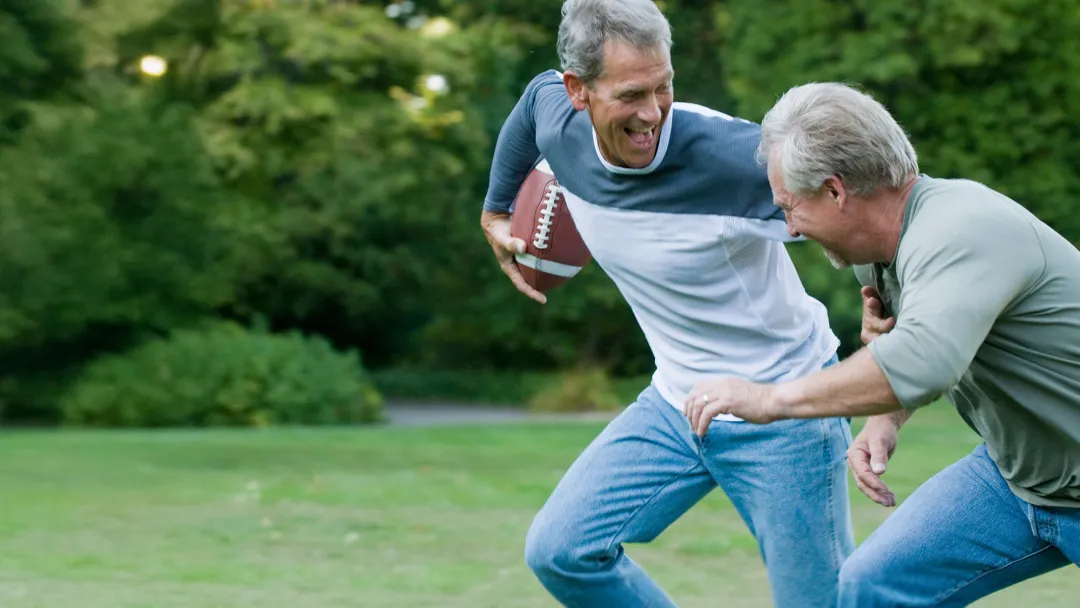 men playing backyard football