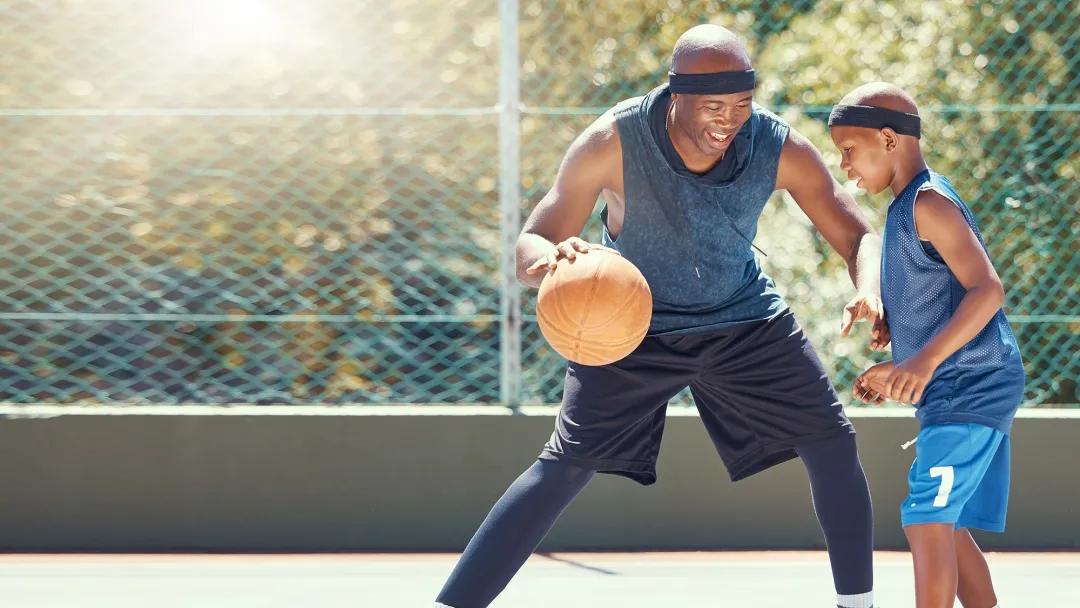 Ortho Sports Med Father son playing basketball