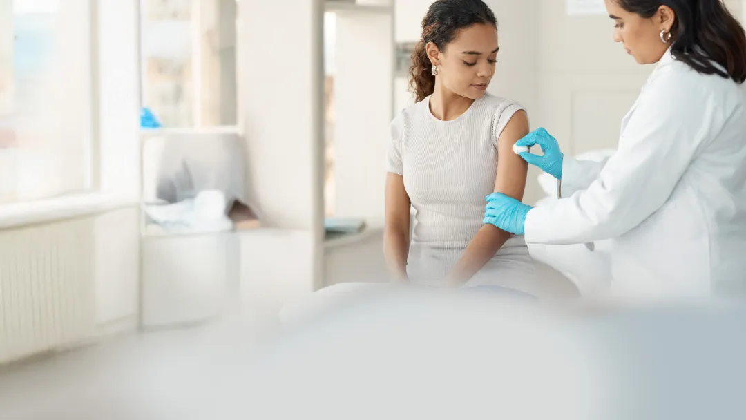 woman preparing for a vaccine