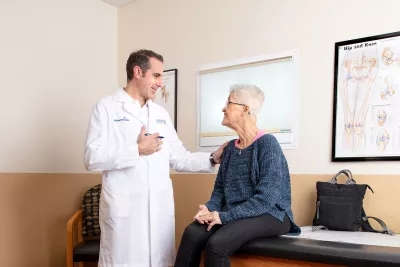 Doctor speaking with patient