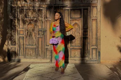Sharlene after bariatric surgery, standing in front of a building