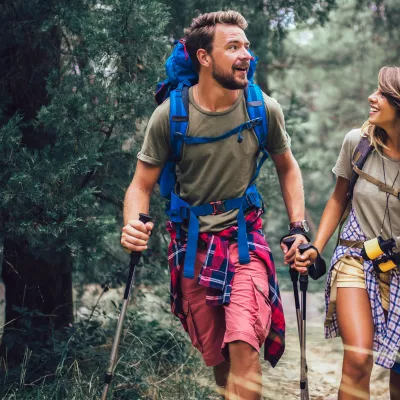 Young couple hiking in woods