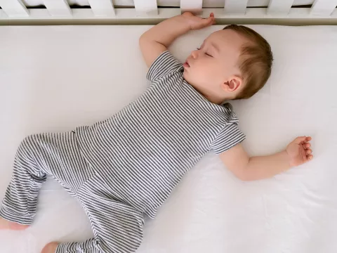 Baby sleeping in crib
