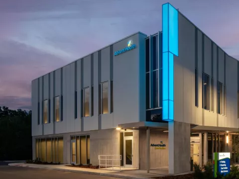An Exterior Photo of an AdventHealth Care Pavilion at Dawn.