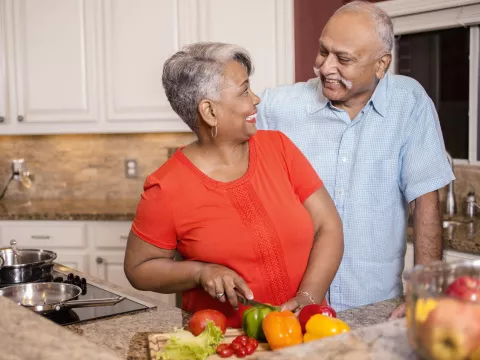 Couple cooking heart healthy meal