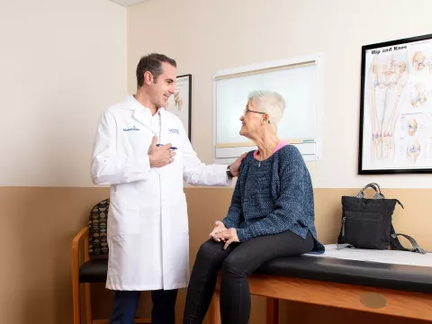 Doctor speaking with patient
