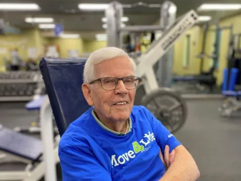 Man using exercise equipment.