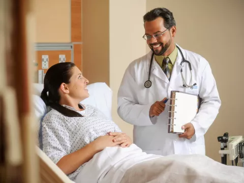 Doctor in room with patient