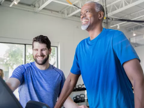 A man does a workout on a treadmill.