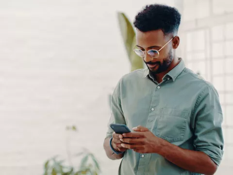 A young man on his smartphone