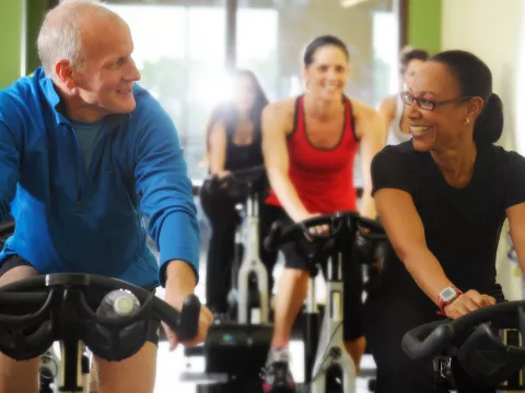 People in a cycling class.