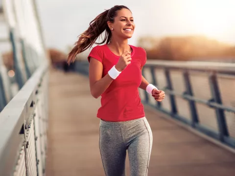 A woman running outdoors.