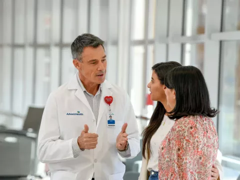 AdventHealth doctor speaking with mother and daughter