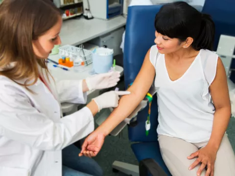 Woman Prepares to Have her Blood Drawn