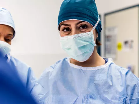 A nurse wearing a mask in the hospital.