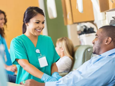 Nurse prepping a patient for lab work