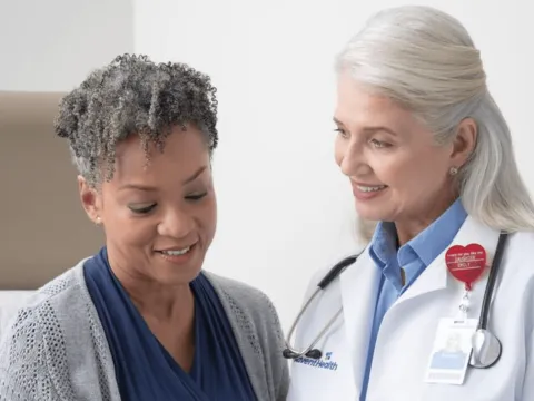 doctor discussing screenings with patient