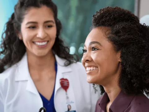 Young woman at wellness exam 