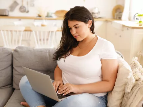 Woman on laptop.