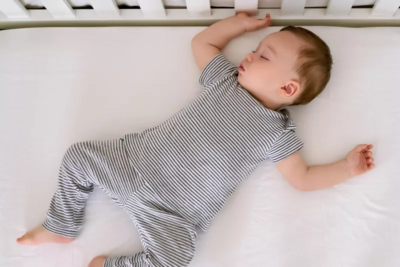 Baby sleeping in crib