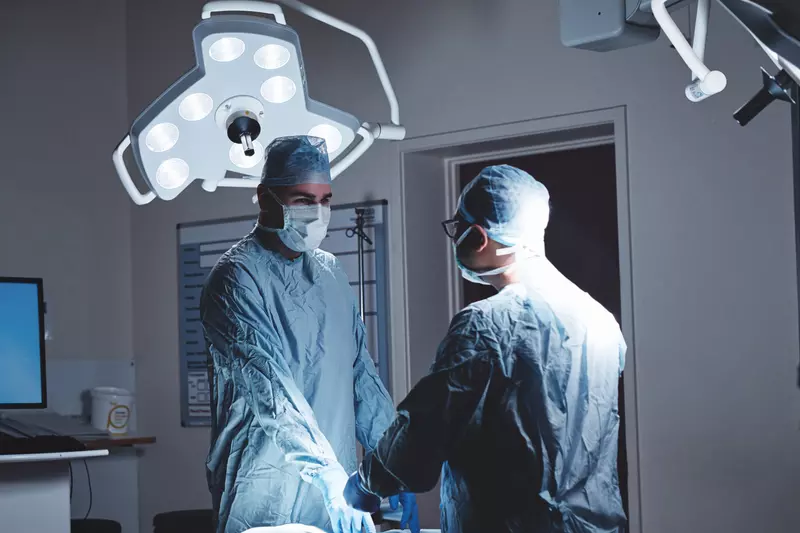 Two Surgeons Prepare the Operating Room for a Procedure. 