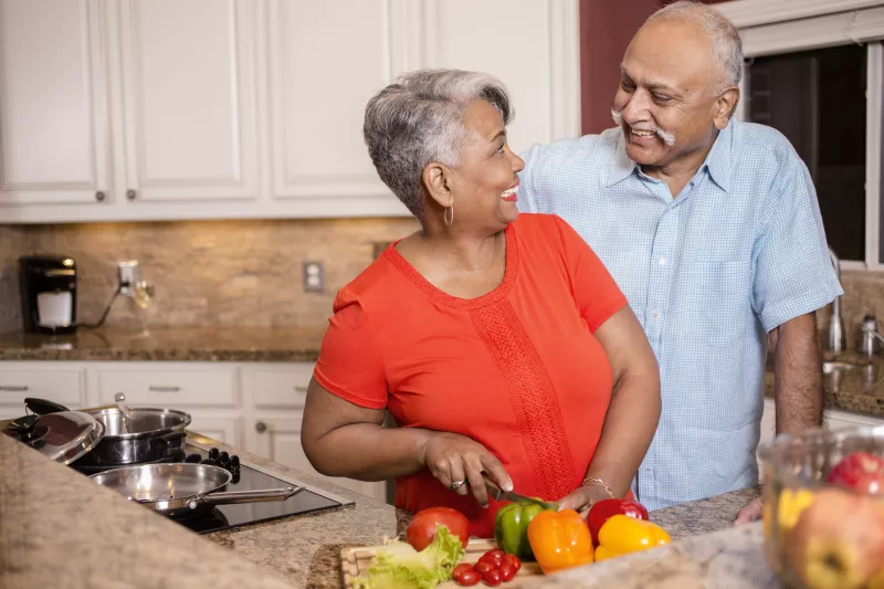 Couple cooking heart healthy meal