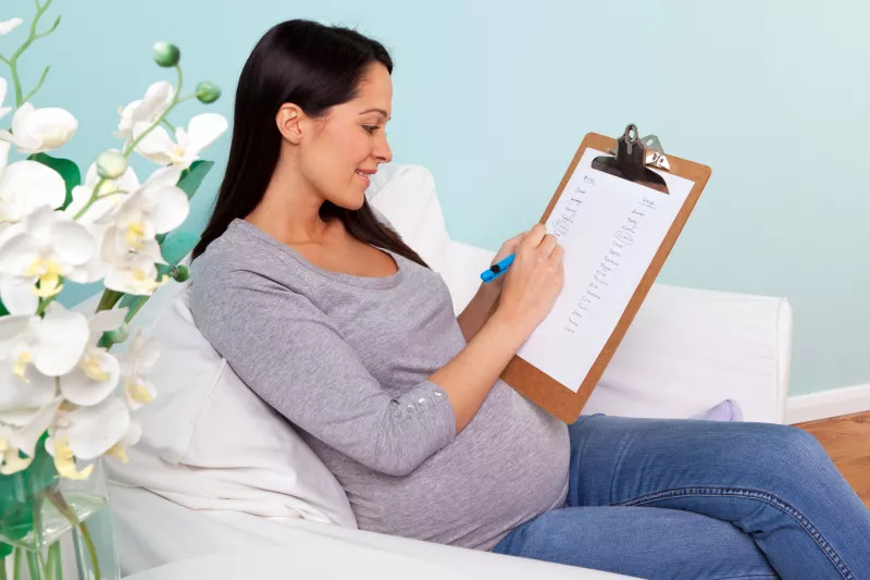 Woman Planning for Maternity Appointment