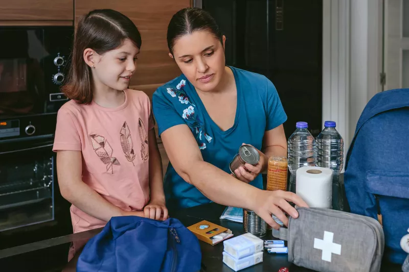 Mom and daughter pack ER go bag