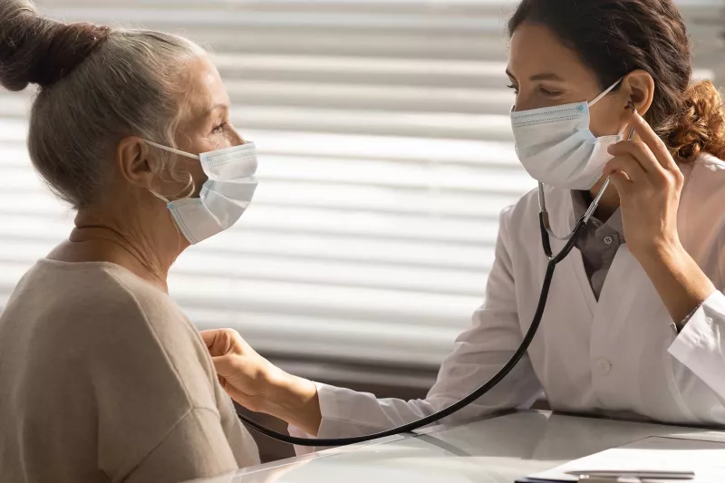 Female Doctor with Female Patient Masks
