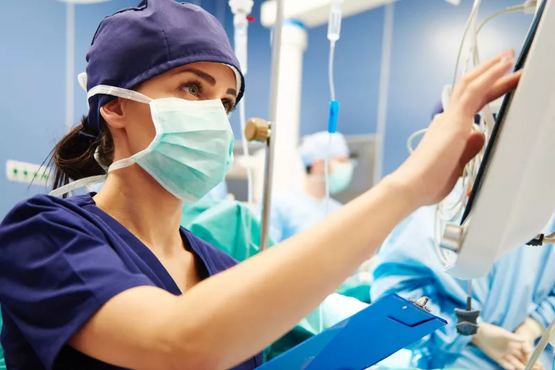 A nurse wearing a mask