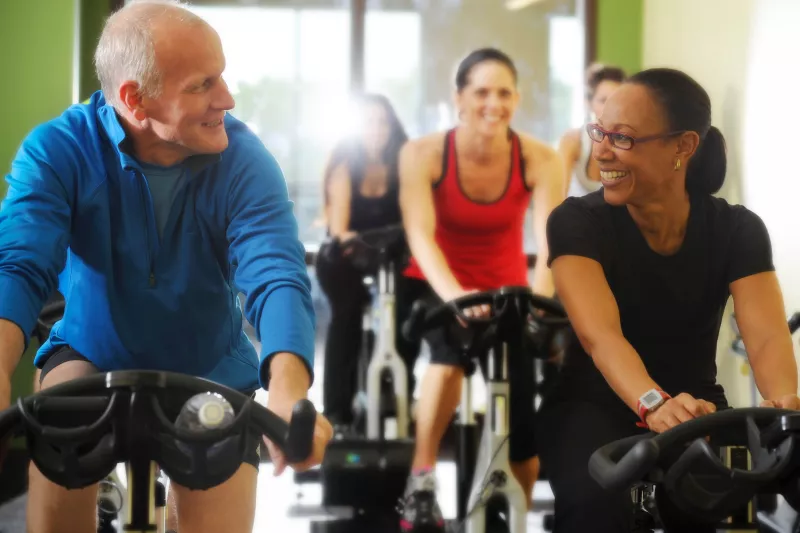 People in a cycling class.
