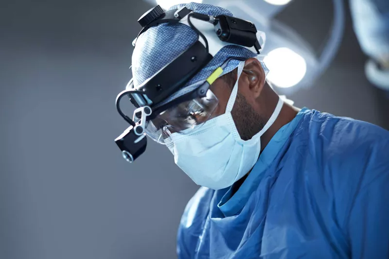 A doctor conducting a surgery.