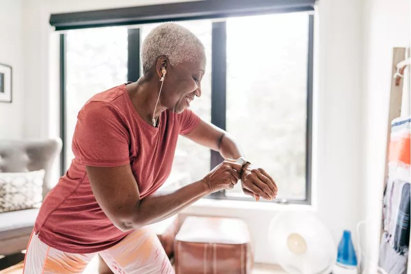 A woman exercising at home.