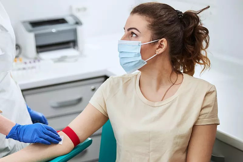 A woman getting ready for a blood test