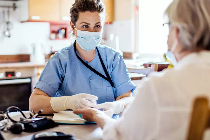 Patient talking to their doctor.