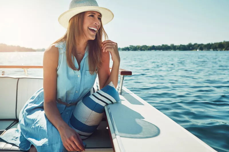 Positive woman on a boat