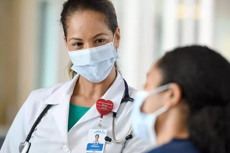 female doctor speaking with patient