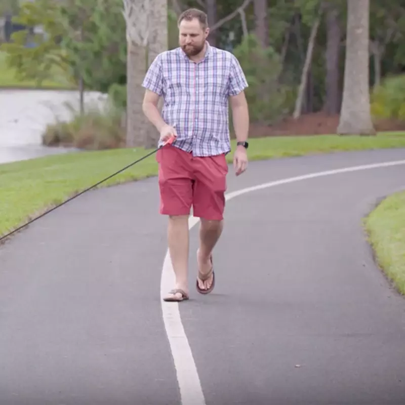 AdventHealth patient Chris Cooper walking his dog