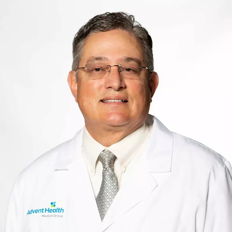A professional headshot of Doctor Carlos Fernandez
