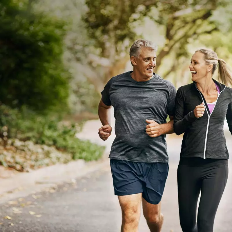 Man and woman jogging outdoors