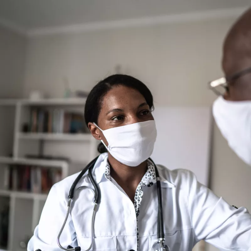 A man visiting his doctor.