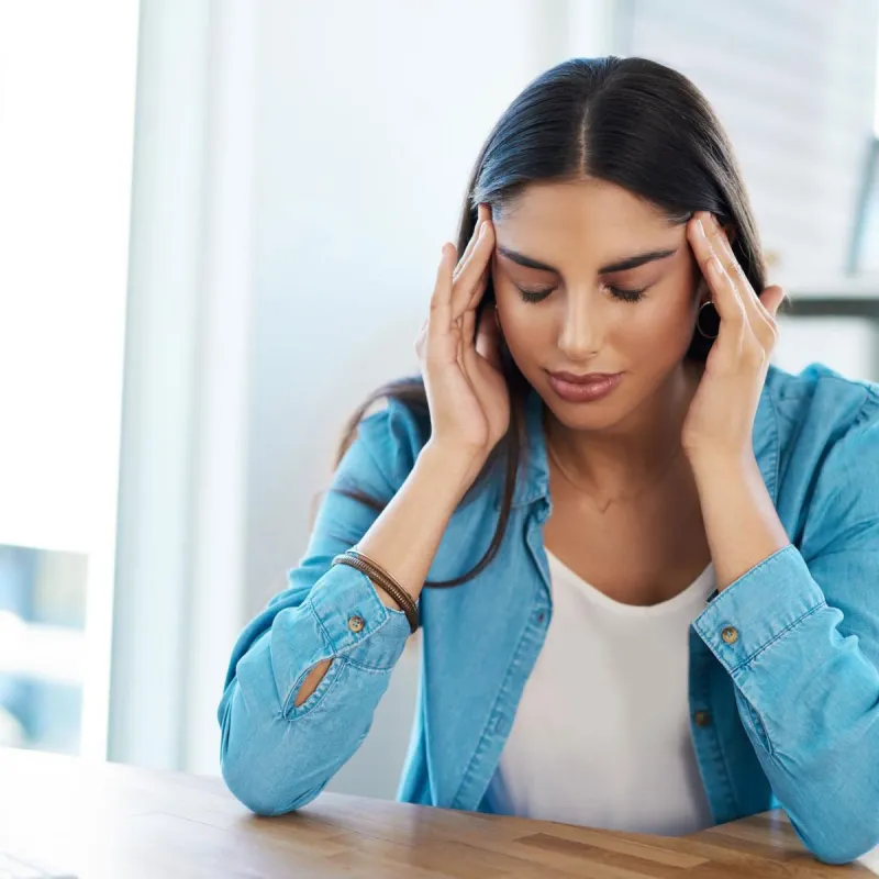 Woman having a migraine 