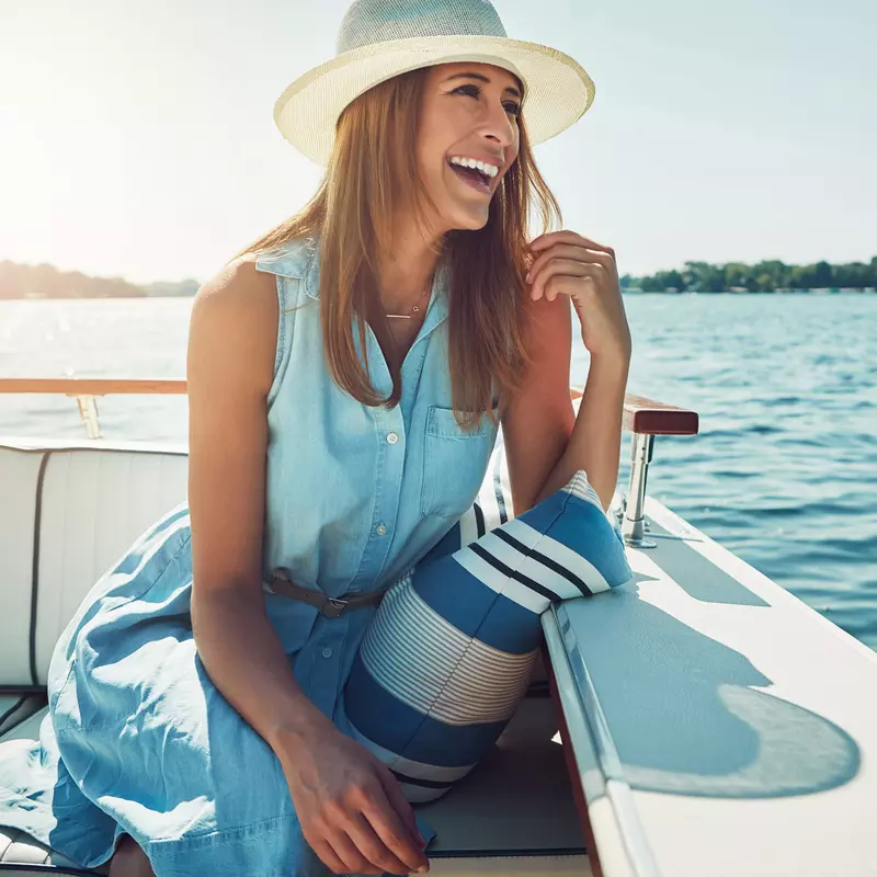 Positive woman on a boat