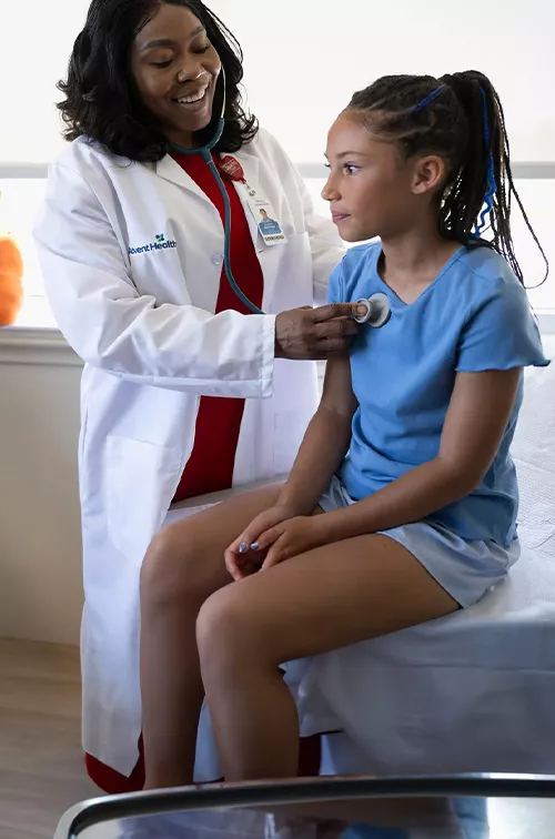 a-girl-beign-checked-by-a-doctor